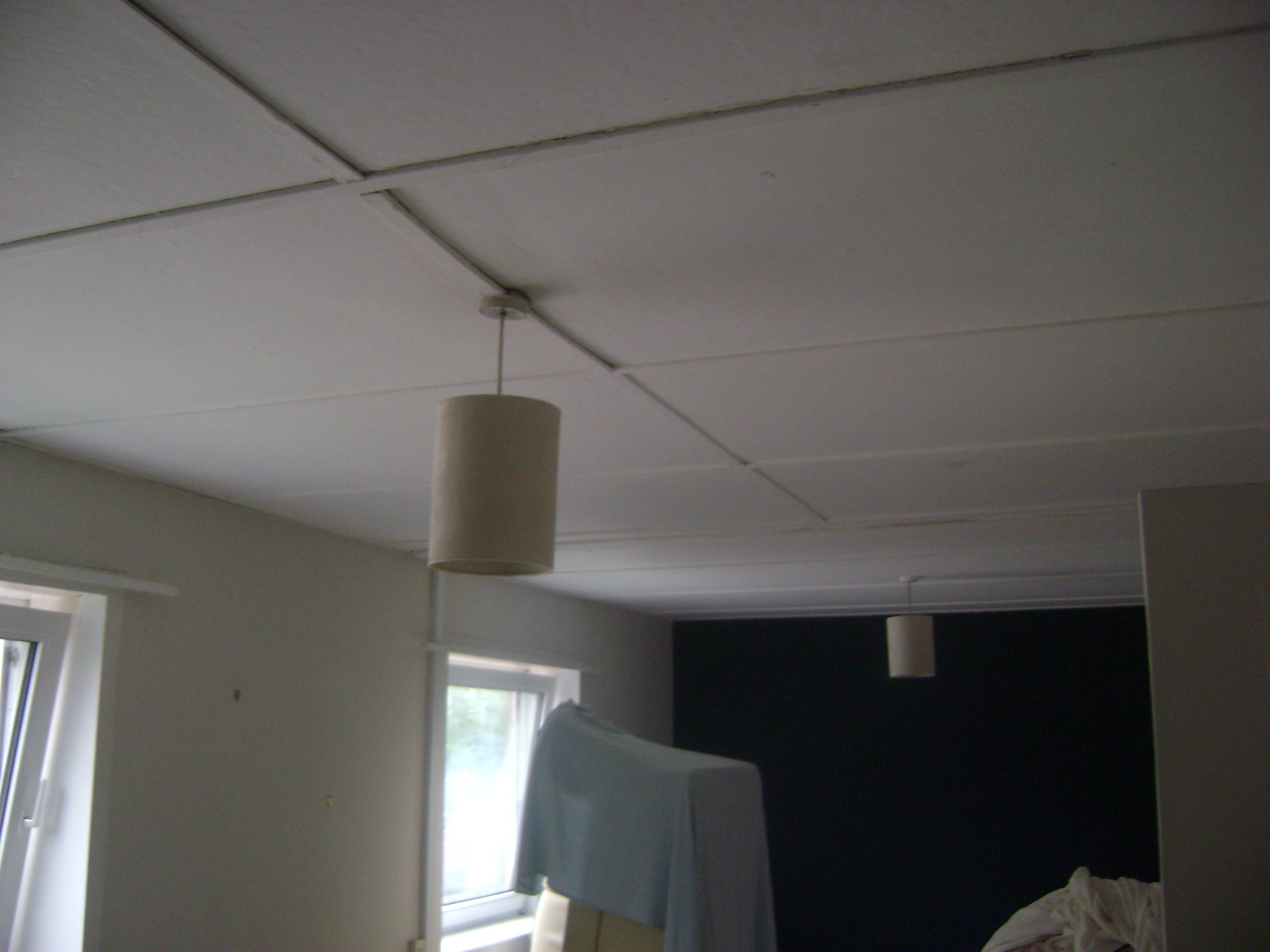 You can see that this ceiling is dated and in need of a more modern look