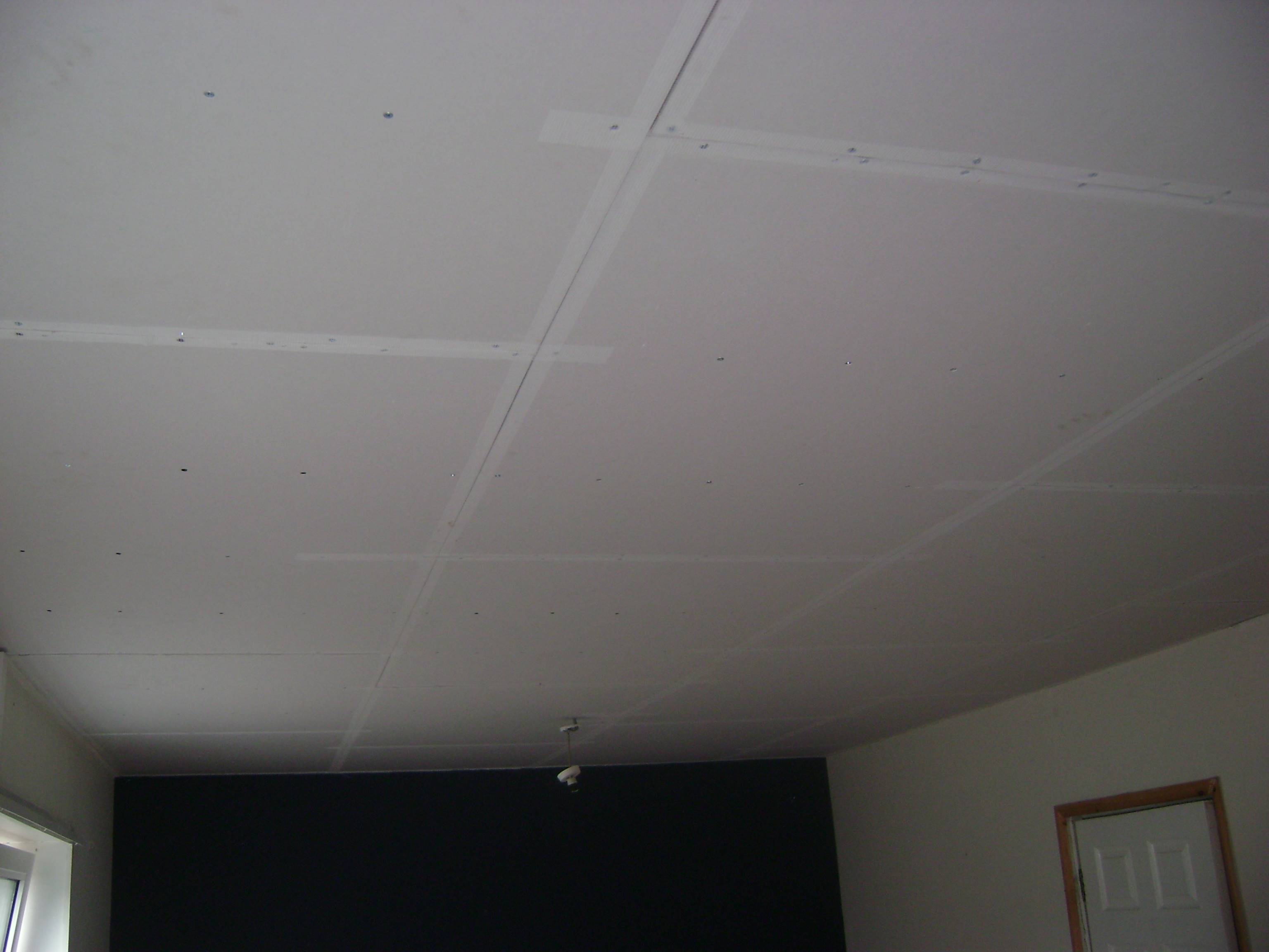 After removing the timber battens the ceiling was overboarded ready for plastering