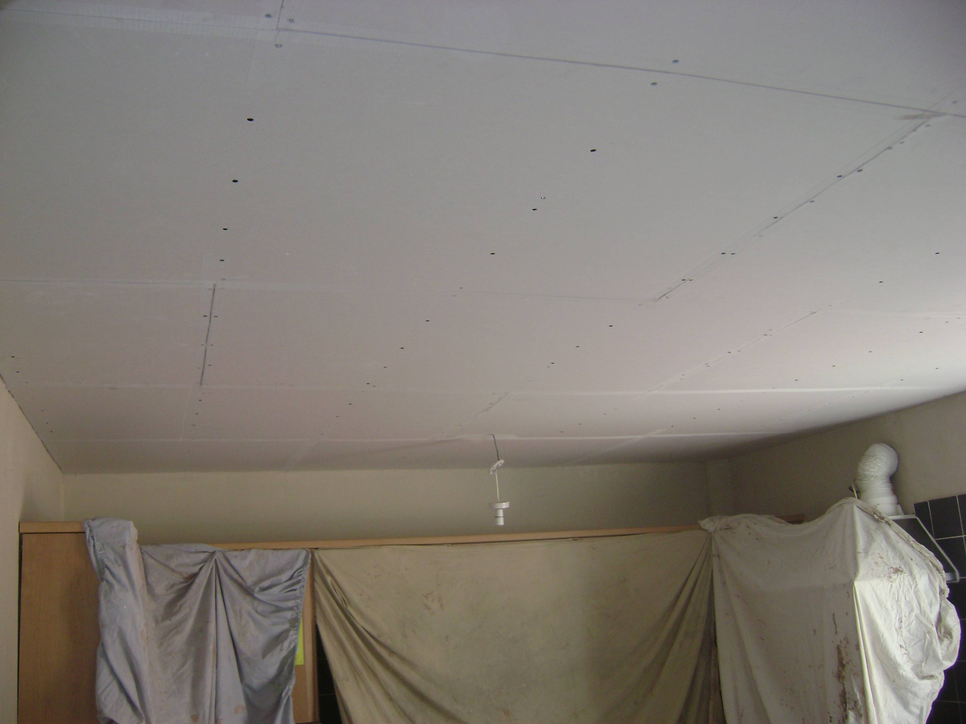 After scraping back the blown areas, it became apparent that the board was no good, so the whole ceiling was overboarded